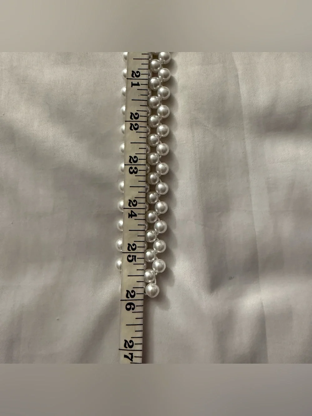 Faux pearls elasticized waistband skinny belt with gold tone rectangle buckle